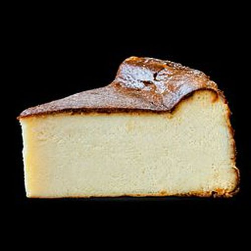 Slice of burnt cheesecake by The Creme Bakery, served at Charming Cafe